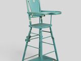 an image of a blue high chair with a tray on it