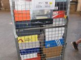 a metal cart with several boxes on it in a warehouse