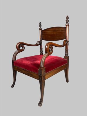 an image of a chair with a red velvet seat and a wooden frame
