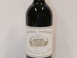 a bottle of wine that is sitting on a table