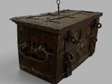an old wooden chest with metal handles on a gray background