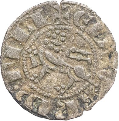 une pièce d'argent sur laquelle est représenté un lion