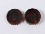 pair of red and black marbled glass stud earrings