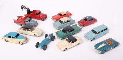 a lot of toy cars that are sitting on a table
