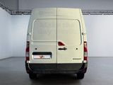 a white van that is parked in a room