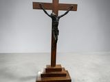 a wooden crucif with a wooden cross on top of it