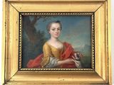 tableau représentant une femme tenant un chien, dans un cadre doré