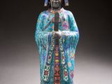 an image of a statue of a man holding a sword