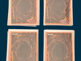 four pieces of plastic with a design on them on a blue background