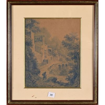 une photo encadrée représentant un paysage avec un château en arrière-plan