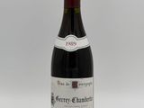 a picture of a bottle of red wine on a white background