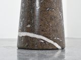 a vase with flowers in it sitting on a table