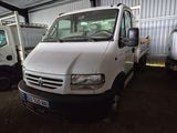 a white van that is parked in a garage