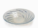 a glass bowl that is sitting on a white surface
