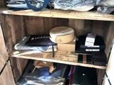 a wooden shelf with many items on it in a room