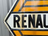 a yellow and black sign that says renault on it