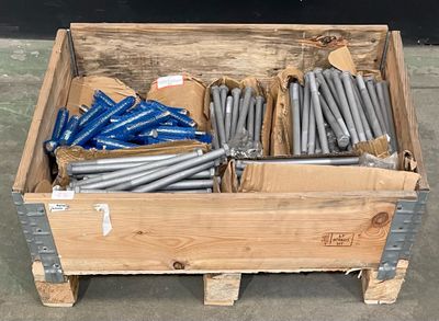 a wooden box with a bunch of metal rods inside of it