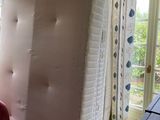 an image of a room that has a mattress in it