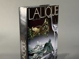 the front cover of a book with a glass of wine on it