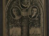 an old picture of a family tree with a picture of a man, woman, and child