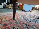 a close up view of a rug on the floor