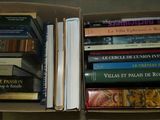 a lot of books in a box on the table