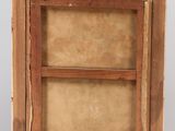 an old wooden easel with a painting on top of it