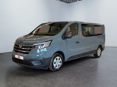 a picture of a blue van in a showroom