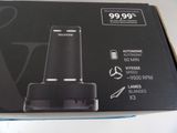 the box is open to show the contents of the device