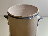 two cups sitting on top of each other on a table