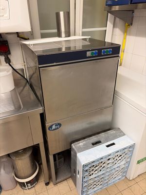 an image of a commercial kitchen with stainless steel appliances
