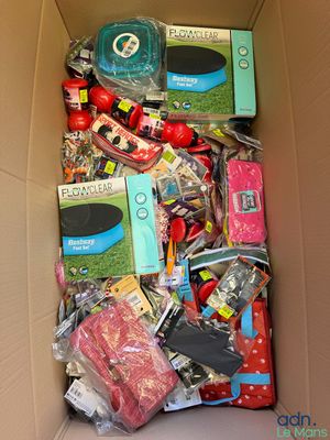 a cardboard box filled with assorted items in it