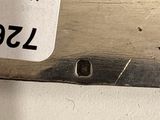 a close up of a pair of scissors on a table