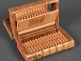a small wooden box that has many compartments inside of it