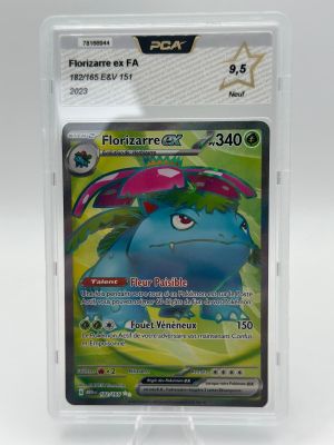 a close up of a pokemon card in a plastic case