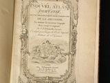 an open book with a picture of a man riding a horse on it