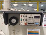 a machine that is sitting inside of a building