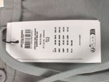 a label on the back of a bag with a tag attached to it
