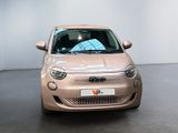a small car that is parked in a room