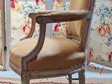 two chairs that are sitting in front of a window