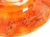 a close up of a bowl with a hello kitty design on it