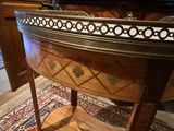 a wooden table with a mirror on top of it