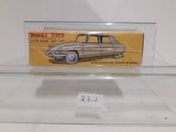 a glass display case with a toy car on it