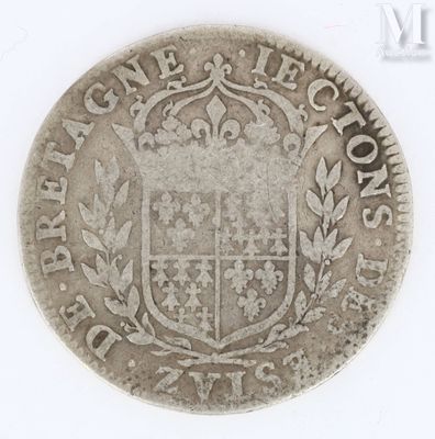 an old silver coin with a coat of arms on it