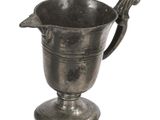 a silver cup with a handle on a white background