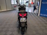 a motorcycle that is parked inside of a building
