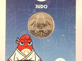 a close up of a coin with a cartoon character on it