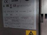 a sign on the door of a machine that is not working
