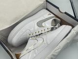 Nike Air Force 1 Low blanche et dorée