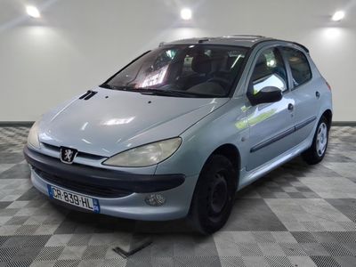 a picture of a silver car parked in a garage